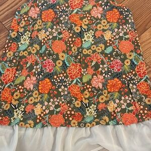 Floral Sleeveless Top with Sheer Hem